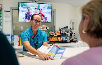 Image of child using membership card